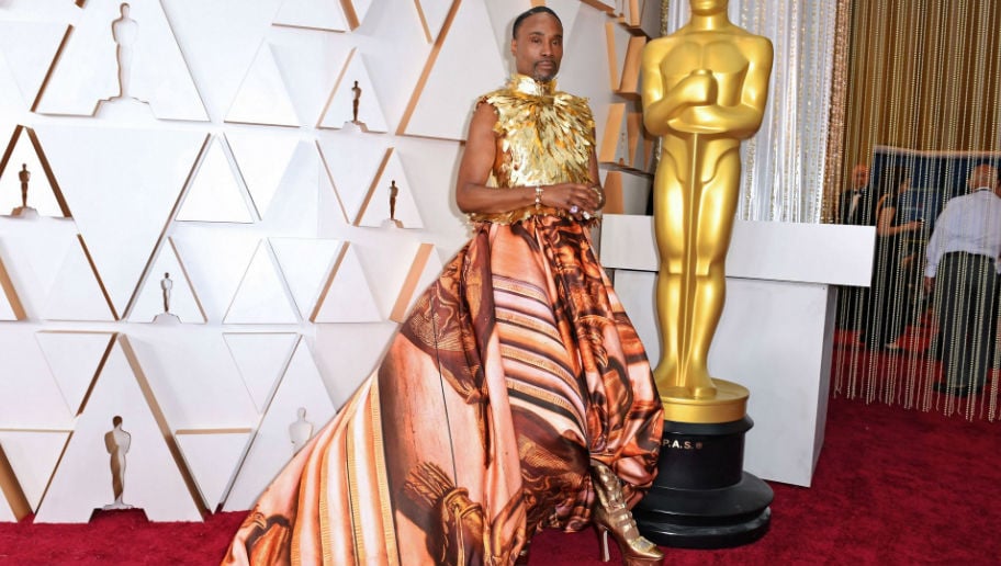 Billy Porter Thrills Twitter by Showing Up to Oscars in a Dress and Gold Feather Vest: ‘Stunning’